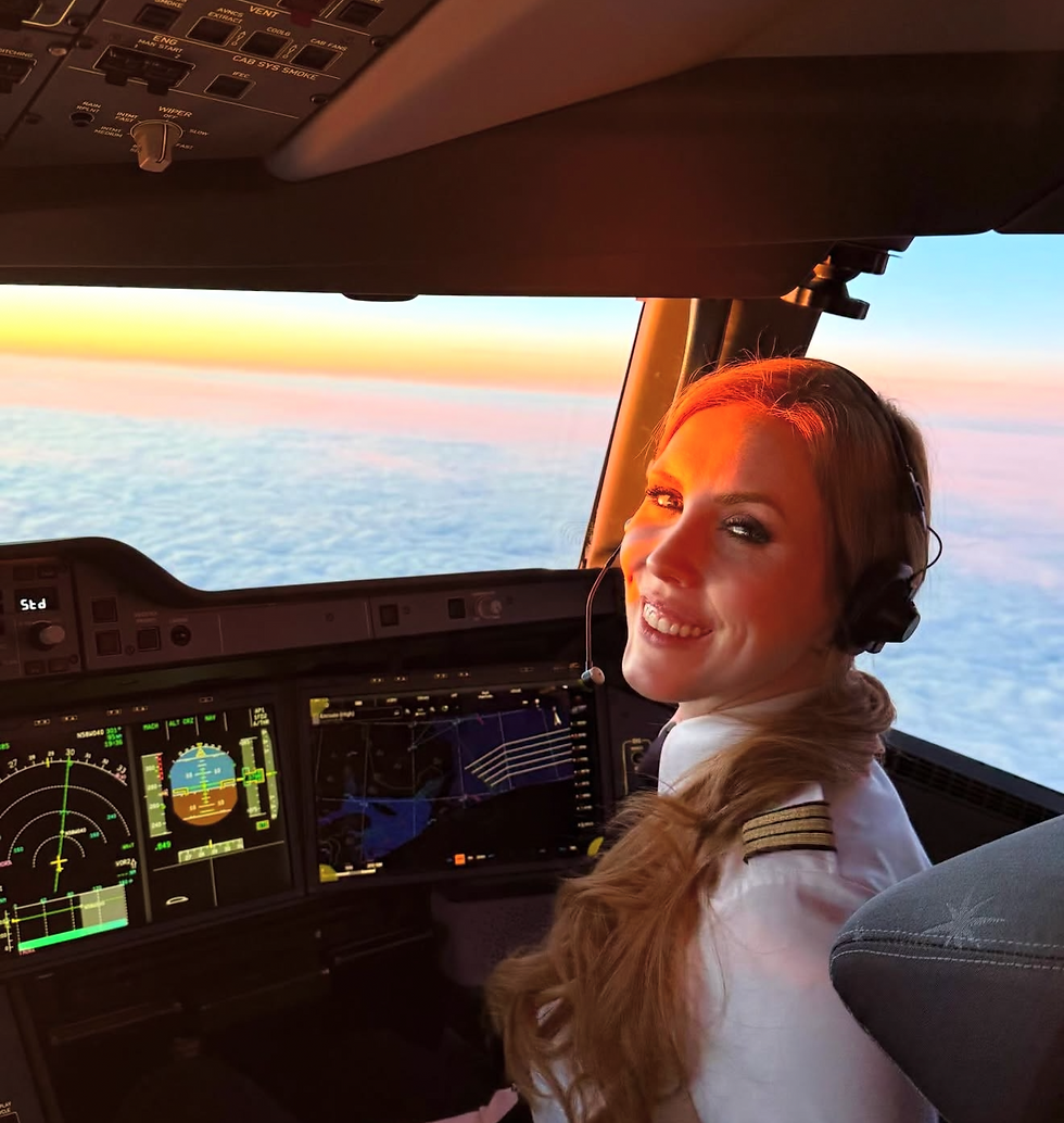 weibliche Pilotin im Cockpit